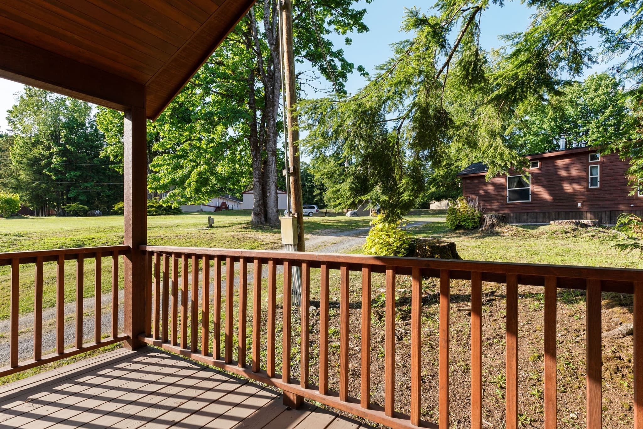 View across the resort lawn from the cabin porch