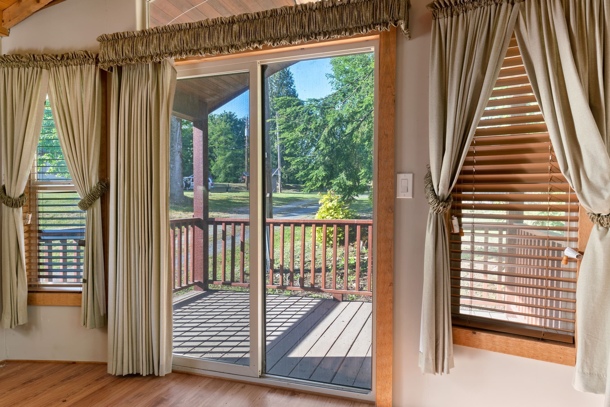 Sliding glass door opening onto the cabin deck
